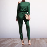 Versatile Asymmetrical Jumpsuit Available in Vibrant Fuchsia, Bold Blue, Classic Black, and Lush Green
